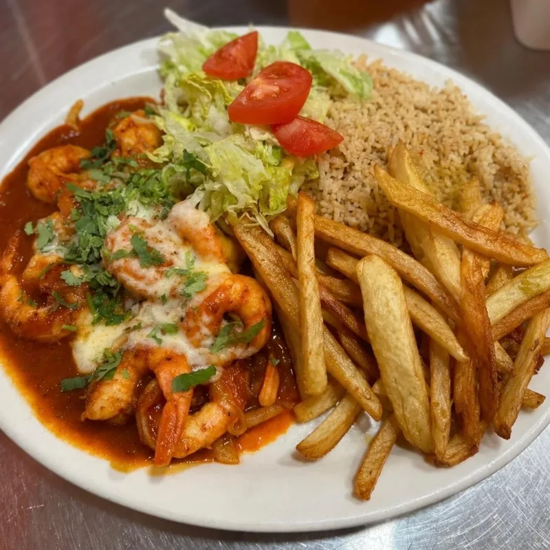 Camarones a la diabla with rice, fries and salad