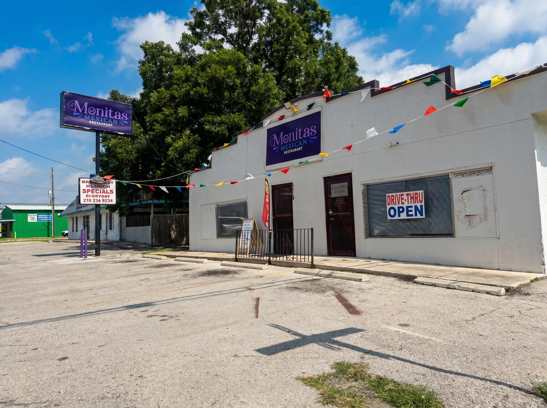 Exterior by day with drive-thru open